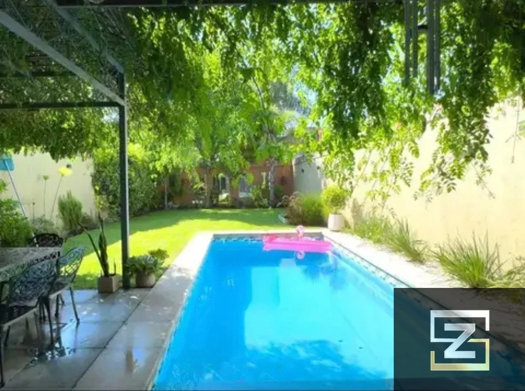 Venta casa premium 7 ambientes ,pileta climatizada jardín, sauna. Devoto - Imagen 2